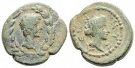 Roman Provincial
LYDIA. Nysa. Augustus, with Julia Augusta (Livia), (27 BC - 14 AD) 
AE Assarion (21mm 6.7g) 
Obv: Bare head of Augustus to right with...
