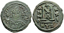 Byzantine
Justinian I (527-565 AD) Kyzikos
AE Follis (36.8mm, 19.3g)
Obv: D N IVSTINIANVS P P AVG, helmeted and cuirassed bust facing, holding globus ...