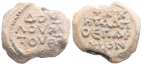 Byzantine Lead Seal ( 5th -7th centuries)
Obv: 3 (three) lines of text
Rev: 4 (four) lines of text
(15.6 g, 25.2 mm diameter)