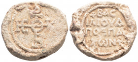 Byzantine Lead Seal ( 7th century)
Obv: Cruciform monogram
Rev: 4 (four) lines of text.
(23.1 g, 26.6 mm diameter)