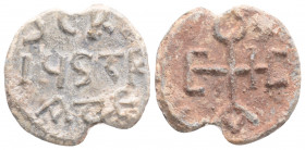 Byzantine Lead Seal ( 7th century)
Obv: Cruciform monogram
Rev: 3 (three) lines of text.
(2.8 g, 17.3 mm diameter)
