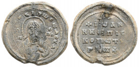 Byzantine lead seal. (7th-9th centuries).
Obv: Uncertain Saint
Rev : 4 (Four) lines text
(5.1g 23.4mm diameter)