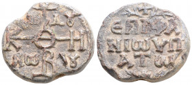 Byzantine Lead Seal ( 9th century)
Obv: Cruciform monogram
Rev: 3 (three) lines of text.
(16.6 g, 26.6 mm diameter)