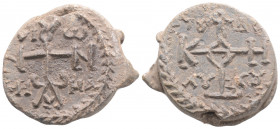 Byzantine Lead Seal ( 9th -10th centuries)
Obv: Cruciform monogram
Rev: Cruciform monogram
(13.7 g, 25.8 mm diameter)