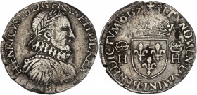Henri III (1574-1589) - Argent - Teston 3e type 1575 B - Rouen.
A/ HENRICVS III D G FRAN ET POL REX B,
Buste d'Henri III, lauré et cuirassé à droite...
