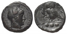 Sizilien. Kamarina.

 Bronze (Tetras). Ca. 410 - 405 v. Chr.
Vs: Kopf der Athena mit phrygischem, flügelverziertem Helm rechts.
Rs: Eule nach link...