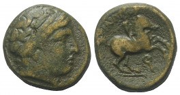 Königreich Makedonien. Philippos II. (359 - 336 v. Chr.).

 Bronze. Ca. 359 - 336 v. Chr. Ungesicherte makedonische Münzstätte.
Vs: Kopf des Apollo...