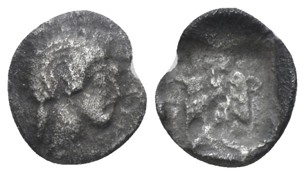 Arabia, Uncertain mint Obol mid V cent.-333 BC, AR 9.00 mm., 0.48 g.
Head of fe...