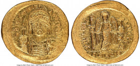 Justinian I the Great (AD 527-565). AV solidus (21mm, 4.47 gm, 6h). NGC MS 5/5 - 3/5, edge crimp. Constantinople, 7th officina, ca. AD 545-565. D N IV...