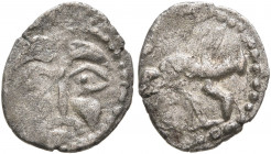 NORTHWEST GAUL. Andecavi. Circa 100-50 BC. Obol (?) (Billon, 11 mm, 0.38 g, 6 h), 'de la Chaloire' type. Celticized facing head. Rev. Boar to right. D...