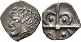 SOUTHERN GAUL. Volcae-Arecomici. Circa 118-76/74 BC. Drachm (Silver, 16 mm, 2.48 g), 'à la tête négroïde' type. Celticized male head with elaborate ha...