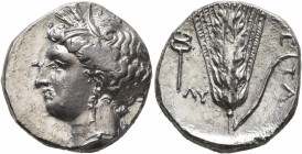 LUCANIA. Metapontion. Circa 340-330 BC. Nomos (Silver, 21 mm, 7.62 g, 10 h). Head of Demeter to left, wearing wreath of grain ears, pendant earring an...