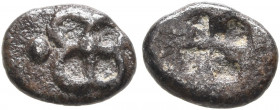 WESTERN ASIA MINOR, Uncertain. 5th century BC. Hemiobol (Silver, 7 mm, 0.26 g). Quadripartite ornament; to left, pellet. Rev. Quadripartite incuse squ...