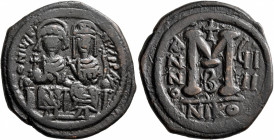 Justin II, with Sophia, 565-578. Follis (Bronze, 30 mm, 12.96 g, 7 h), Nicomedia, RY 9 = 573/4. D N IVSTINVS P P AVG Justin II, holding globus crucige...