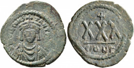 Tiberius II Constantine, 578-582. 3/4 Follis (Bronze, 31 mm, 13.05 g, 6 h), Constantinopolis, 579-582. D m TIb CONSTANT P P AVI Draped and cuirassed b...