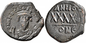 Phocas, 602-610. Follis (Bronze, 30 mm, 13.00 g, 8 h), Constantinopolis, RY 7 = AD 608/9. o N N FOCAS PER [AVς] Crowned bust of Phocas facing, wearing...