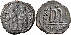 Phocas, 602-610. Follis (Bronze, 27 mm, 10.66 g, 6 h), Theoupolis (Antiochia), RY 1 = 605/6. O N FOCA NЄ PЄ AV Phocas, on the left, standing facing, h...