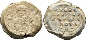 Paulos Nikoulitzes, mid 11th century. Seal (Lead, 25 mm, 15.27 g, 12 h). [Θ] / ΓЄ/Ⲱ/P-[Γ]/IO/C Nimbate bust of Saint George facing, holding spear over...