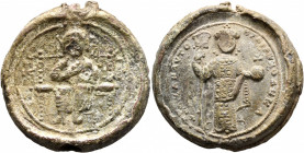 Michael VII Doukas, 1071-1078. Seal (Lead, 33 mm, 43.72 g, 12 h). IC - XC Christ seated facing on an ornate throne, wearing cross-nimbus, raising his ...