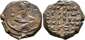 Basileios Apokapes, protoproedros and doux of Edessa, 1078-1081. Seal (Lead, 23 mm, 12.79 g, 12 h). Θ / R/A... Nimbate bust of Saint Basil facing, rai...