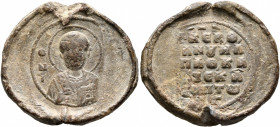Manuel, spatharokandidatos and ek prosopou of the herds, 11th century. Seal (Lead, 25 mm, 8.99 g, 12 h). Θ N/I-... Nimbate bust of Saint Nicholas faci...
