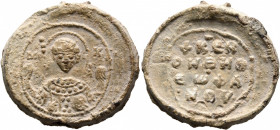 Theophanes, 11th century. Seal (Lead, 24 mm, 11.27 g, 12 h). M-X Nimbate bust of St. Michael facing, holding trefoil scepter in his right hand and glo...