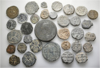 A lot containing 16 bronze coins, 1 bronze weight and 17 lead seals. All: Byzantine. Fine to about very fine. LOT SOLD AS IS, NO RETURNS. 34 items in ...
