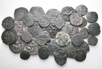 A lot containing 33 bronze coins. All: Islamic. Fine to about very fine. LOT SOLD AS IS, NO RETURNS. 33 coins in lot.