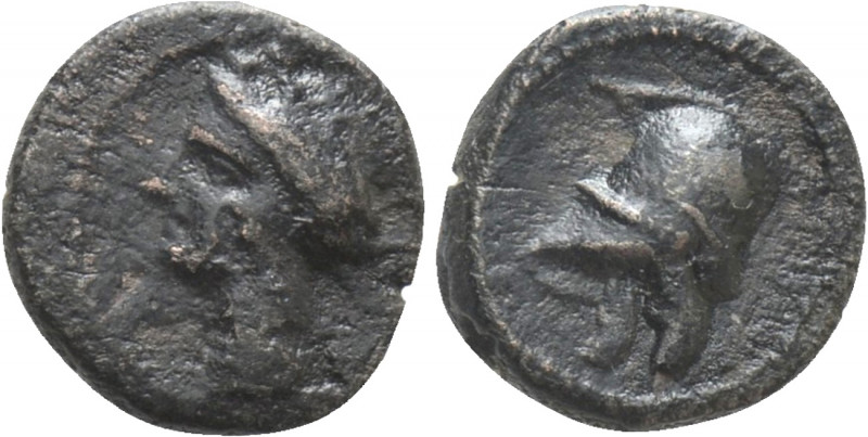 IBERIA. Punic Occupation. Emporion. Ae 1/5 Unit (Circa 237-209 BC). 

Obv: Wre...