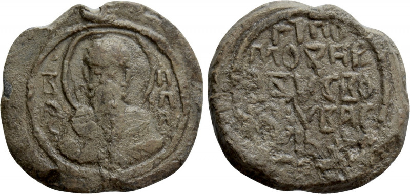 BYZANTINE SEALS. Basil (?). 

Obv: BACIΛE. 
Nimbate bust of saint facing.
Re...