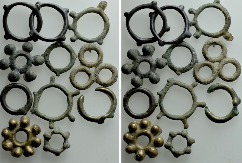 10 Pieces of Celtic Ring Money / Rouelles. 

Obv: .
Rev: .

. 

Condition...