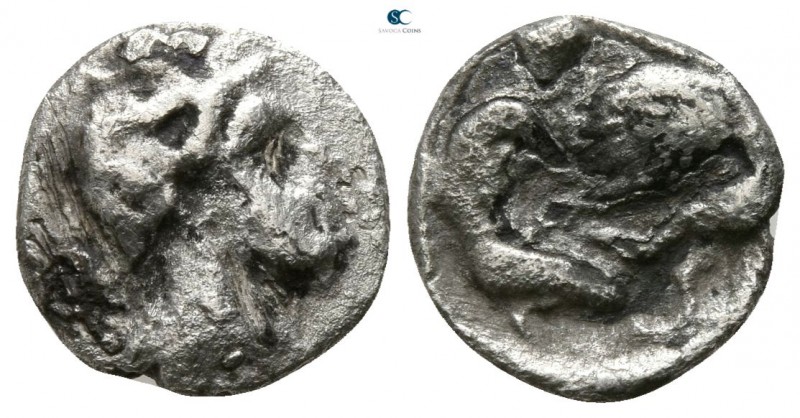 Calabria. Tarentum circa 380-344 BC. 
Diobol AR

8mm., 0,86g.

Helmeted hea...