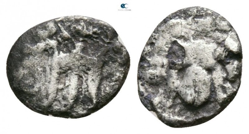 Bruttium. Kroton circa 525-425 BC. 
Obol AR

6mm., 0,33g.

Tripod with legs...