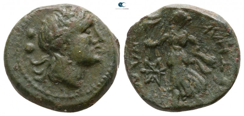 Bruttium. Petelia circa 204 BC. 
Sextans Æ

13mm., 2,76g.

Laureate head of...