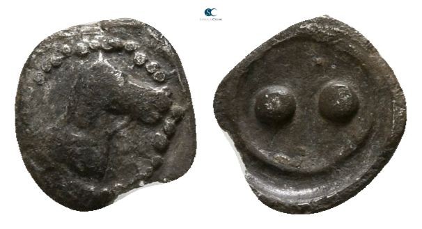 Sicily. Gela . 480/75-475/70 BC
Hexas AR

3mm., 0,09g.

Head of horse right...