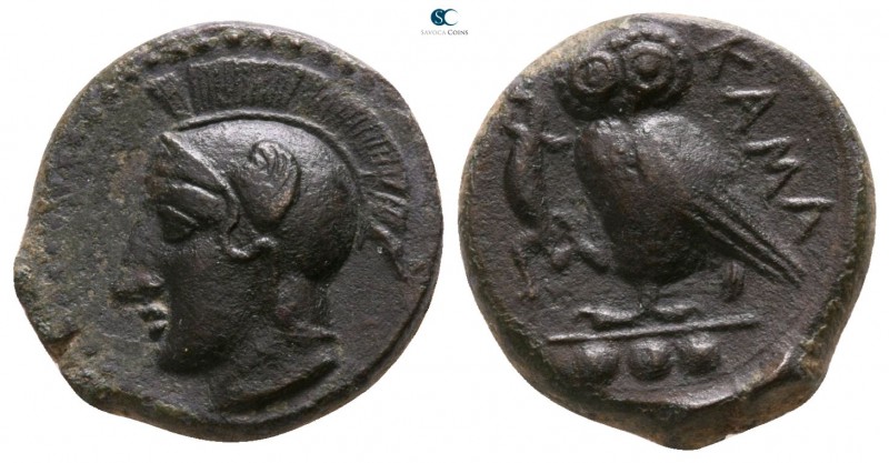 Sicily. Kamarina circa 420-405 BC. 
Tetras Æ

13mm., 3,08g.

Head of Athena...