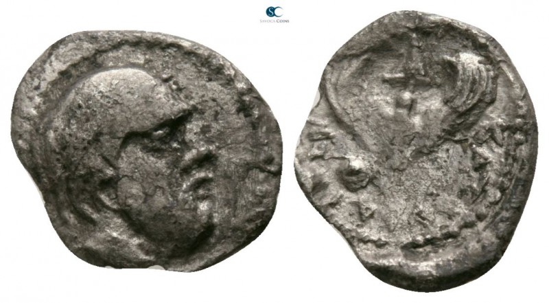 Sicily. Katane circa 430-415 BC. 
Litra AR

11mm., 0,57g.

Head of Silenos ...