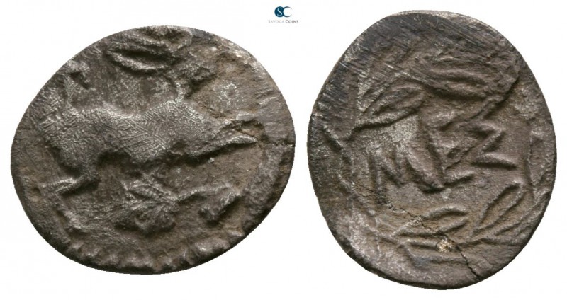 Sicily. Messana circa 461-396 BC. 
Litra AR

11mm., 0,64g.

Hare leaping ri...