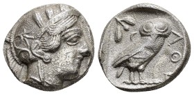 ATTICA.Athens.(Circa 454-404 BC).Tetradrachm.

Obv : Helmeted head of Athena right.

Rev : AΘE.
Owl standing right, head facing; olive sprig and ...