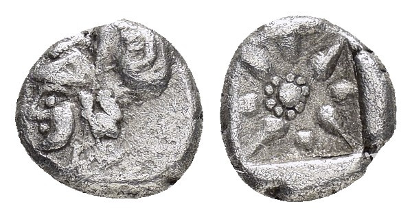 UNCERTAIN.(440-390 BC).Hemiobol

Obv : Helmeted head of Athena left.

Rev : Star...