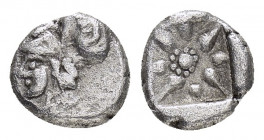 UNCERTAIN.(440-390 BC).Hemiobol

Obv : Helmeted head of Athena left.

Rev : Star of eight rays within incuse square. 
Asia Minor coins # 9785.

Condit...