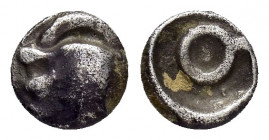 ASIA MINOR.Uncertain.Ionia or Caria(?).(Circa 500-450 BC).Obol.

Obv : Head of lion left.

Rev : Circular symbol.
SNG Kayhan 744.

Condition : Darkly ...