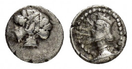 CILICIA.Uncertain.( 4th century BC).Hemiobol. 

Obv : Two female heads facing inwards and the profiles overlapping.

Rev : Crowned, bearded Persian Ki...