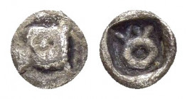 LYDIA.Uncertain.(5th century BC).Hemiobol. 

Obv : Head of lion right.

Rev : Uncertain symbol, possibly a diadem, within square linear border; all wi...