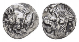 MYSIA.Kyzikos.(Circa 5th century BC).Obol.

Obv : Forepart of boar to left.

Rev : Head of lion to left within incuse square, above floral star.
SNG F...