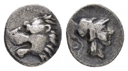 PAMPHYLIA.Side.(3rd-2nd centuries BC).Obol.

Obv : Helmeted head of Athena right.

Rev : Head of lion left with open mouth.
SNG France 739; SNG Aulock...