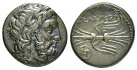 SELEUKID KINGS of SYRIA.Seleucia Pieria.(2nd century BC).Ae.

Obv : Laureate head of Zeus right.

Rev : ΣEΛEYKEΩN.
Thunderbolt; monogram within circle...