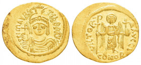 MAURICE TIBERIUS.(582-602).Constantinople.Solidus.

Obv : D N mAVRC TIb P P AVG.
Helmeted, draped and cuirassed bust facing, holding globus cruciger.
...