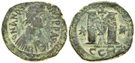 ANASTASIUS I.(491-518).Constantinople.Follis.

Obv : DN ANASTASIVS PP AVG.
Pearl diademed, draped, cuirassed bust right.

Rev : Large M, star left, cr...