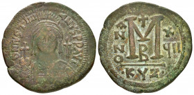 JUSTINIAN I.(527-565).Cyzicus.Follis.

Obv : D N IVSTINIANVS P P AVG.
Helmeted and cuirassed bust facing, holding globus cruciger and shield decorated...